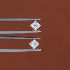 In Tweezer View Of Off White French Cut Loose Moissanite Pair