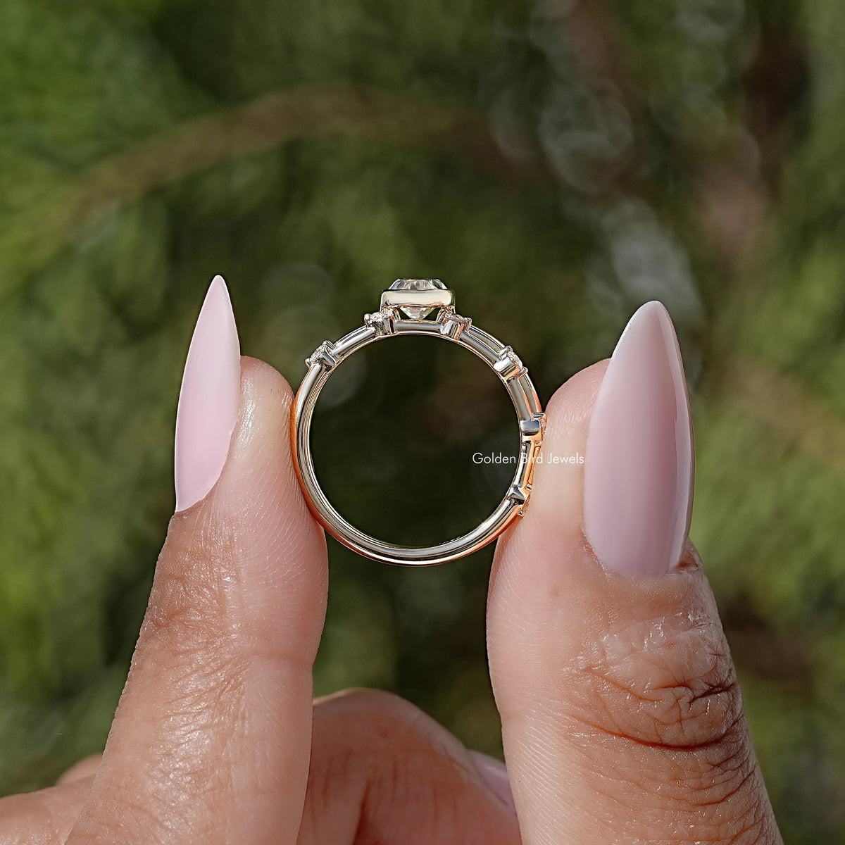 Back view of oval solitaire bridal ring set with a raised prong setting
