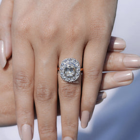 In front finger View Of Elongated Old Mine Cushion Cut Moissanite Halo Ring