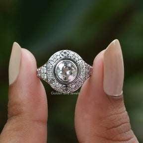 Front View of Old European Round Cut Moissanite Ring In two Fingers