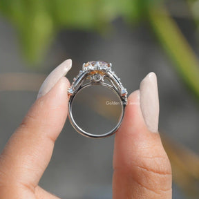 Back View of Old European Round Cut Moissanite Ring In two fingers