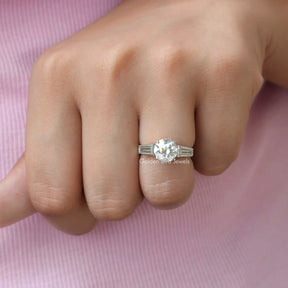 View of Round Cut Three Stone Moissanite Ring In Finger
