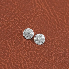 Close-Up View of  Round Cut Diamond Matching Pair In White