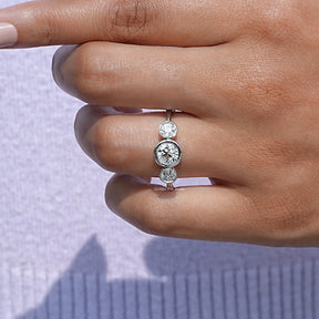 Close-Up View of Old European Round Cut Diamond Three Stone Ring In White Gold