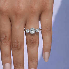 View of Old European Round Cut Diamond Three Stone Ring In Finger 
