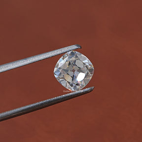 In Tweezer View of Moissanite Old Mine Cushion Cut Loose