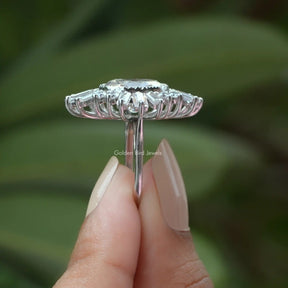 Side View of Old  Cushion Cut Moissanite Engagement Ring In two fingers