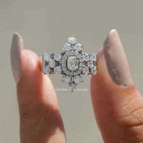 Front View of Cushion Cut Moissanite Halo Anniversary Ring In two Fingers
