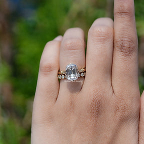 In finger front view of Old Mine Cushion Moissanite engagement ring 