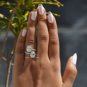 Front View of Old Mine Cushion And Round Cut Ring In Finger