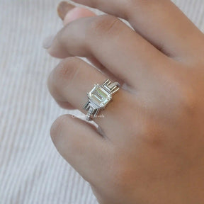 View of Old Mine Emerald Cut Moissanite Ring In Finger