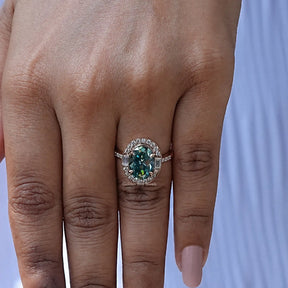 View of Blue Old Mine Oval Cut Moissanite Halo Ring In finger