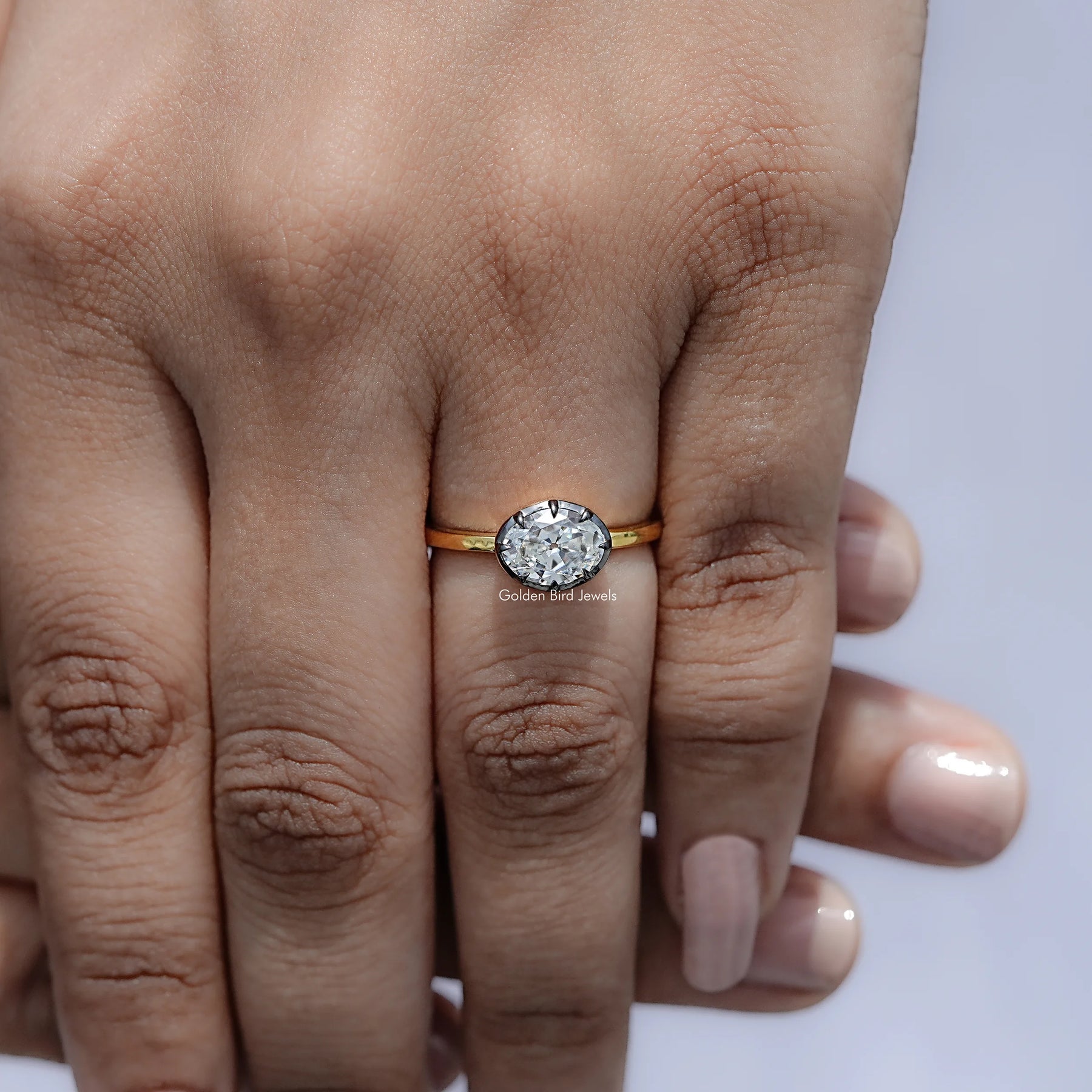 Close view of East West Oval Cut Moissanite Solitaire Ring