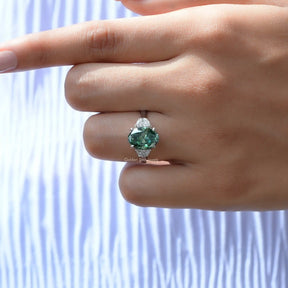 Oval Moissanite Three Stone Ring In finger