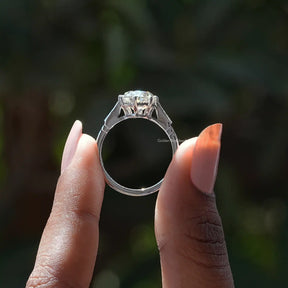 Back View of Oval Cut Moissanite Ring In two fingers