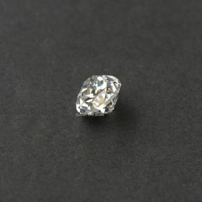 Cross View Of Old mine pear cut loose moissanite