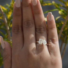 View of Pear and Criss Cut Moissanite Toi Et Moi Ring In Finger