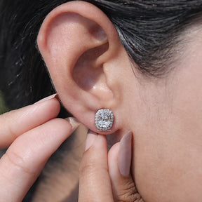 Close-Up View of Cushion Cut Diamond Halo Stud Earrings In White gold