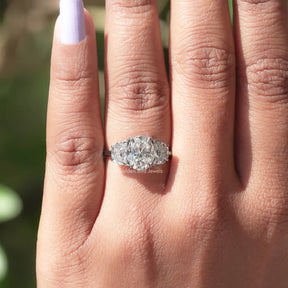 View of Oval And Half Moon 3 Stone Moissanite Ring In White Gold