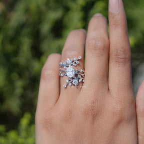 In Finger view of Oval Cut Moissanite Twisted Shank Bridal Ring Set