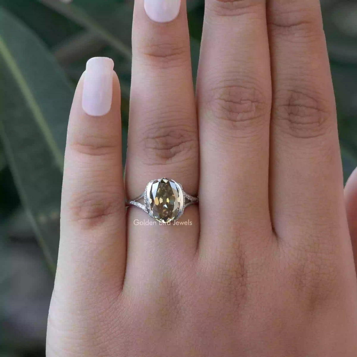 Detailed View Of Brown Oval Cut Bezel Set Ring