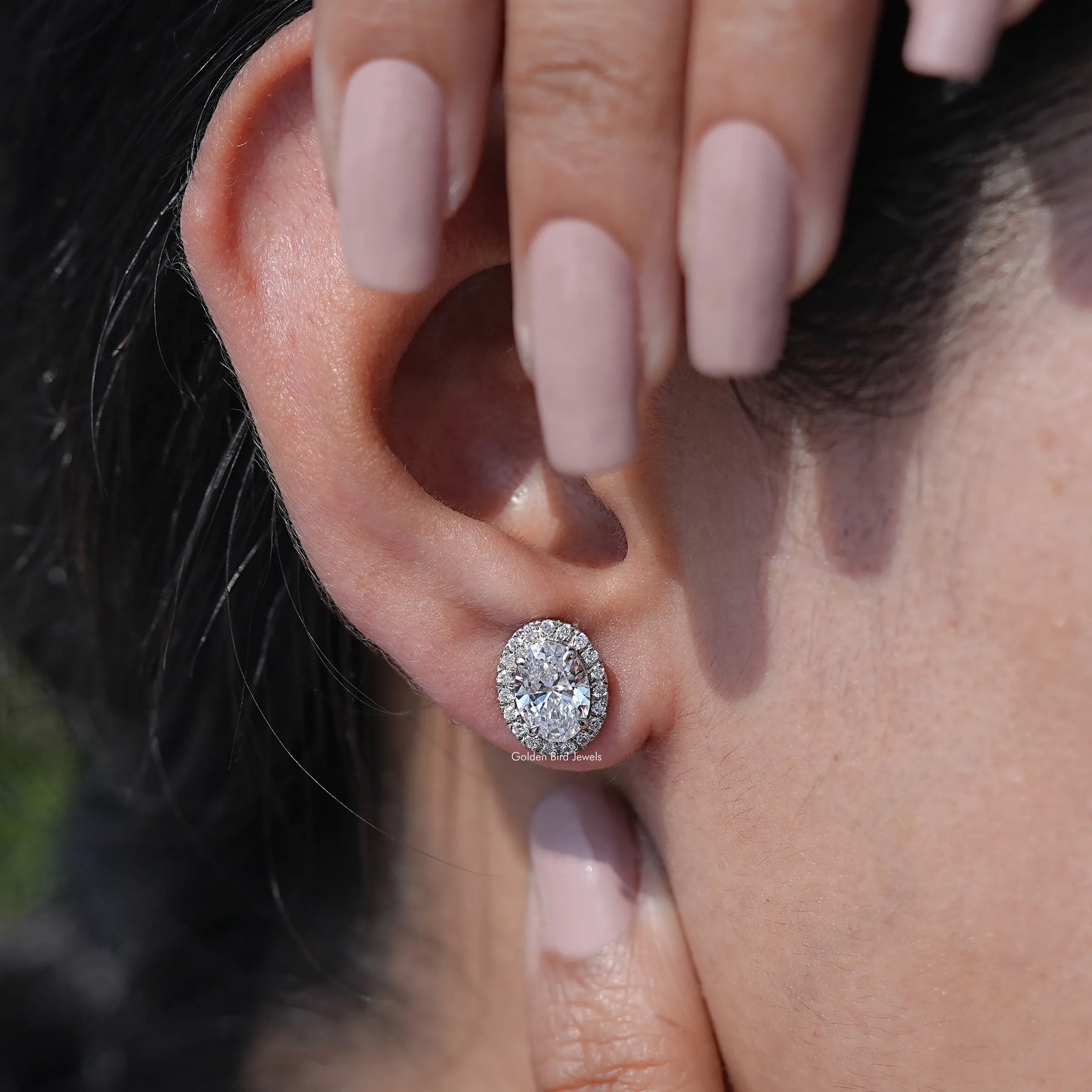 Close-Up View of Brilliant Cut Lab Diamond Halo Stud Earrings In White gold 