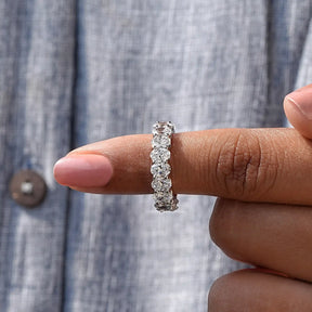 In finger front View of Oval Cut Diamond Half Eternity Wedding Ring In White Gold