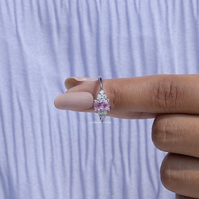 In finger front View of Oval Cut Gemstone Engagement Ring In White Gold