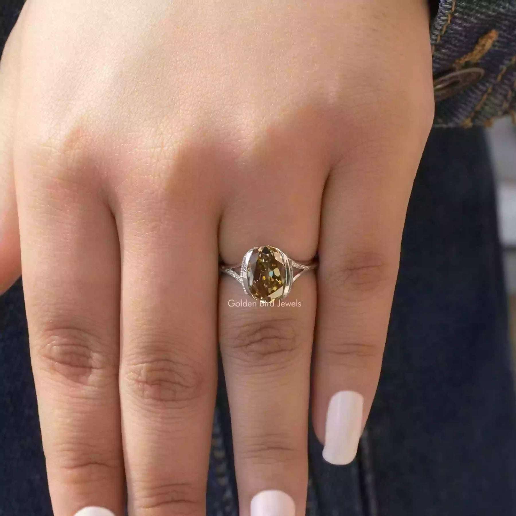 View of Bezel Set Oval Cut Moissanite Ring In White Gold