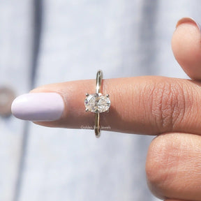 In finger front View of Oval Cut Hidden Halo Engagement Ring 