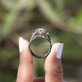 Back View of Oval Cut Lab Diamond Bridal Ring In two fingers