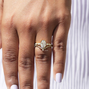 Close-Up View of Oval Cut Moissanite Ring In Yellow Gold