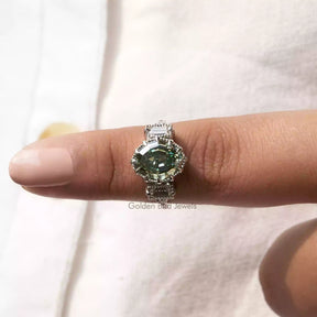 In finger front View of Green Oval Cut Moissanite Engagement Ring