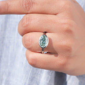 View of Oval Cut Solitaire Engagement Ring In White Gold
