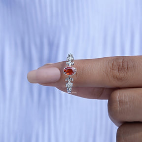 In finger front View of Red Ruby Accent Stone Gemstone Engagement Ring