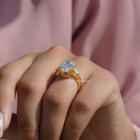 Oval Cut Moissanite Cluster Engagement Ring In Finger