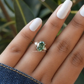 Three Stone Moissanite Engagement Ring In finger