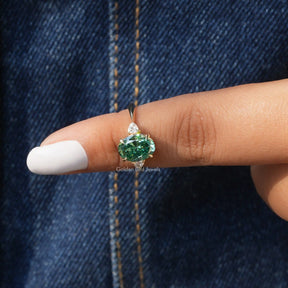 In finger front View of Oval Cut 3 Stone Moissanite Ring