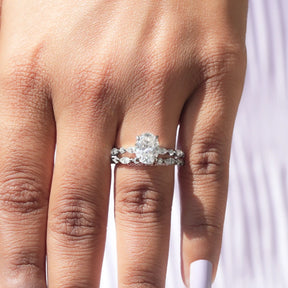 View of Oval Cut Moissanite Bridal Ring Set In finger
