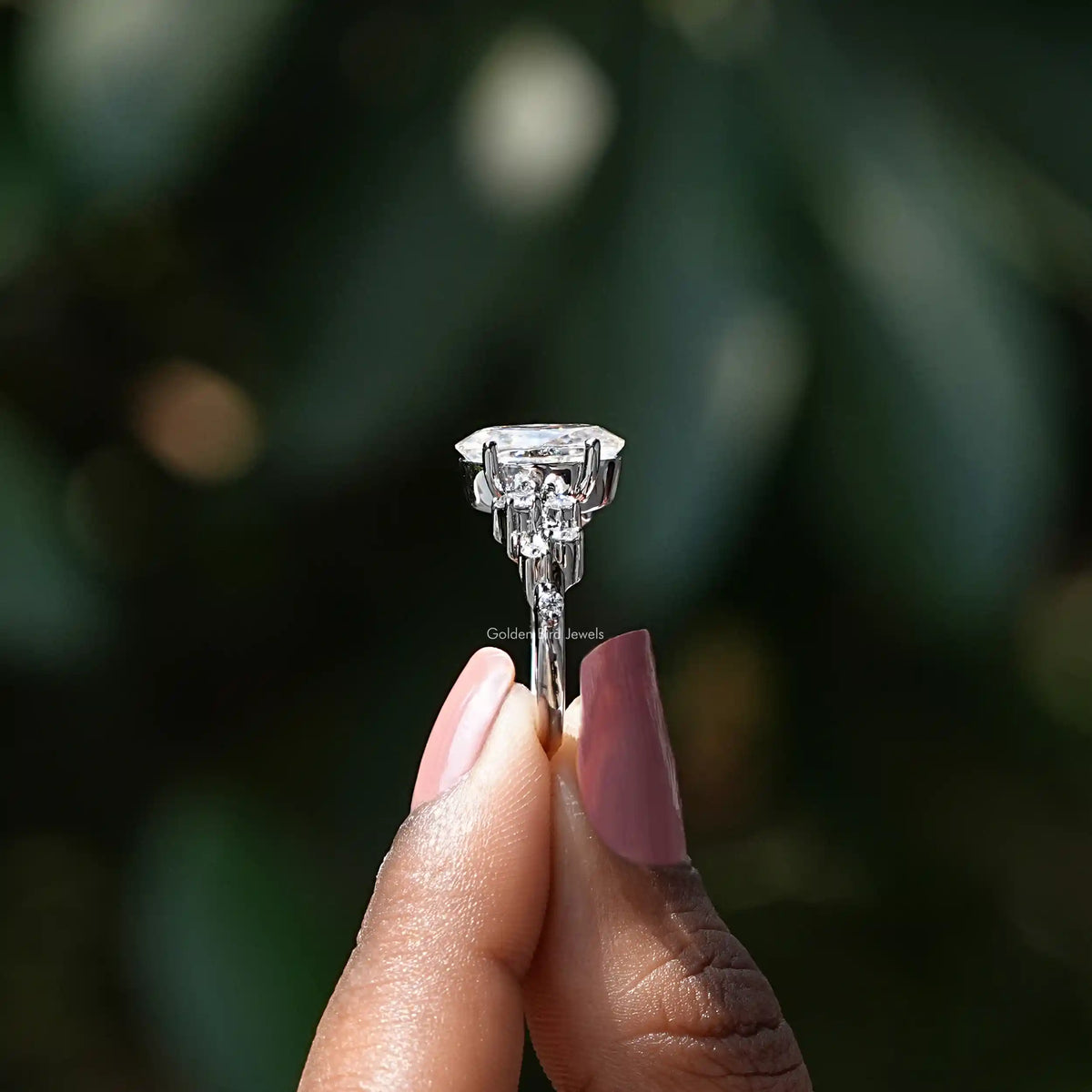 side view of a solitaire oval cut moissanite ring  for women 
