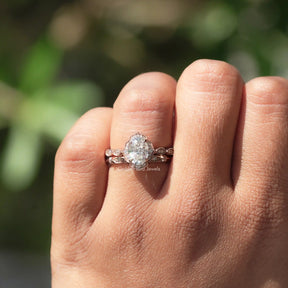 View of Oval Cut Moissanite Halo Ring In Yellow Gold