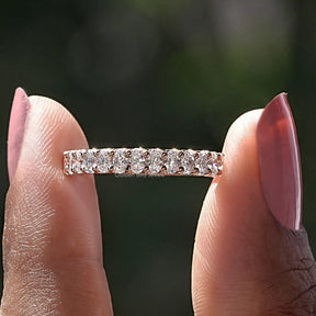 Front View of Oval Shaped Lab Grown Diamond Eternity Band In two Fingers