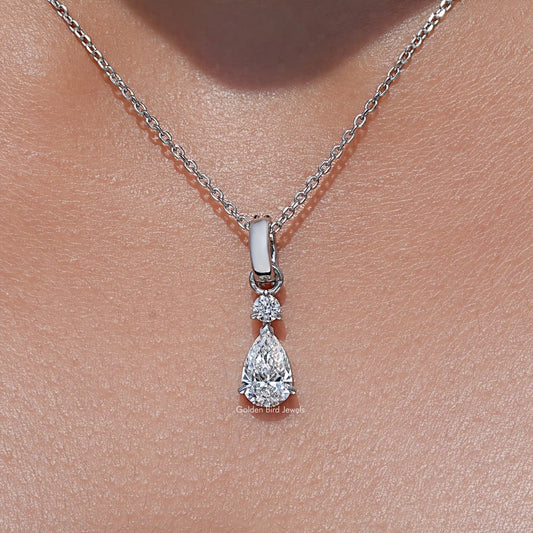 Silver necklace pendant with pear-cut and round-cut lab-grown diamonds