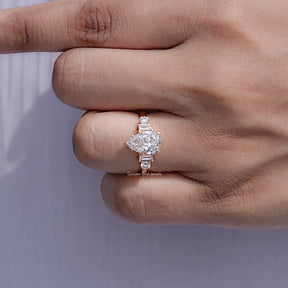 Detailed view of Pear And Baguette Cut Diamond Five Stone Ring