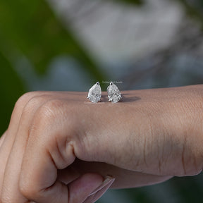 In Hand View Of 2CTW pear Cut  Solitaire Stud Earring 