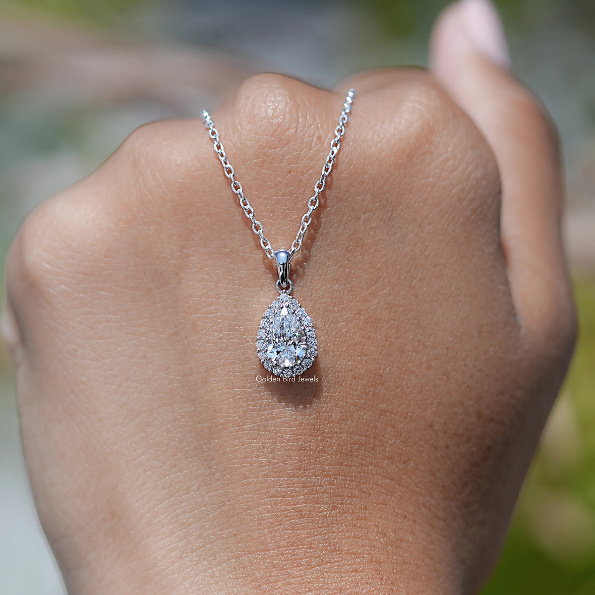 Front View of Pear Cut Diamond Halo Pendant Necklace