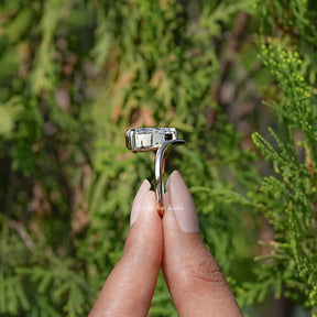 Side View of Pear Cut Lab Diamond Solitaire Ring In two fingers