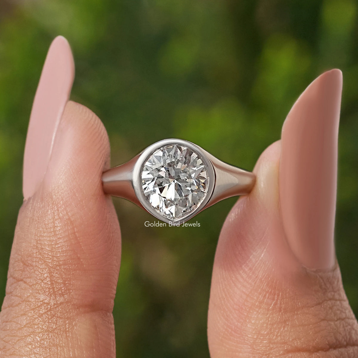 Pear Cut Lab Grown Bezel Set Engagement Ring