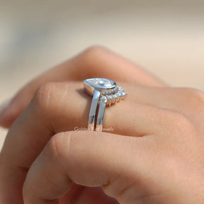Side View of Pear Cut Moissanite Bridal Ring Set In finger