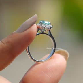 Back View of Pear Cut Moissanite Engagement Ring Set In two fingers